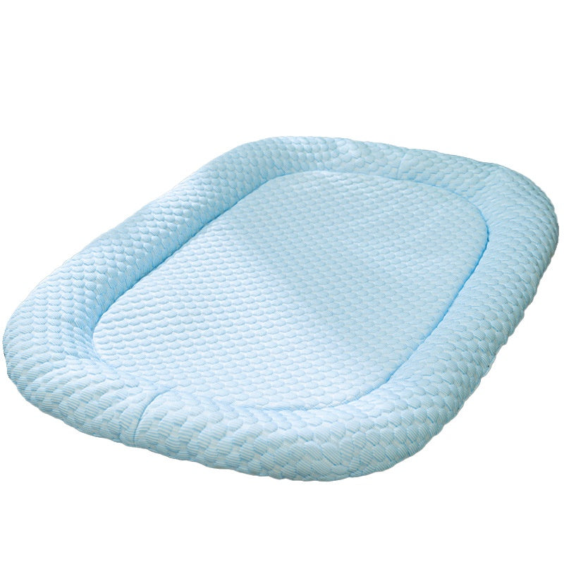 Close-up view of breathable fabric on a supportive cooling pet mat.