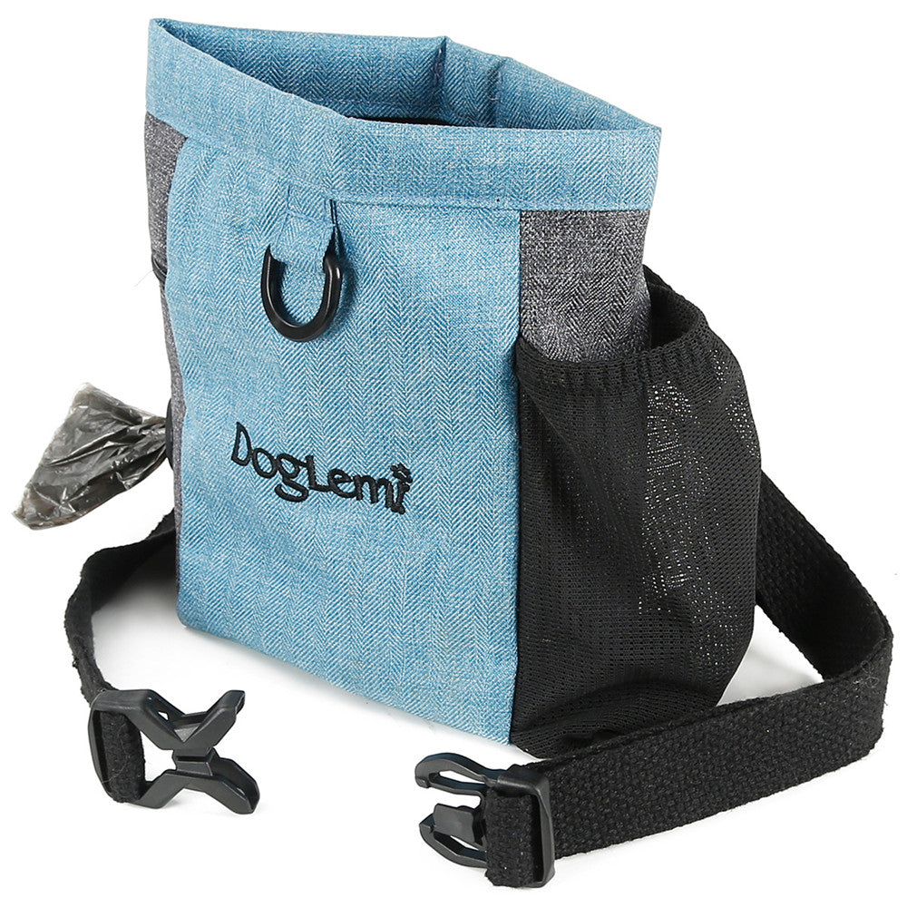 Dog owner using the PawTreat™ training treat pouch during outdoor obedience training with a happy dog.