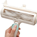 PawClean™ Reusable Cat Hair Remover Roller removing loose cat hair from fabric