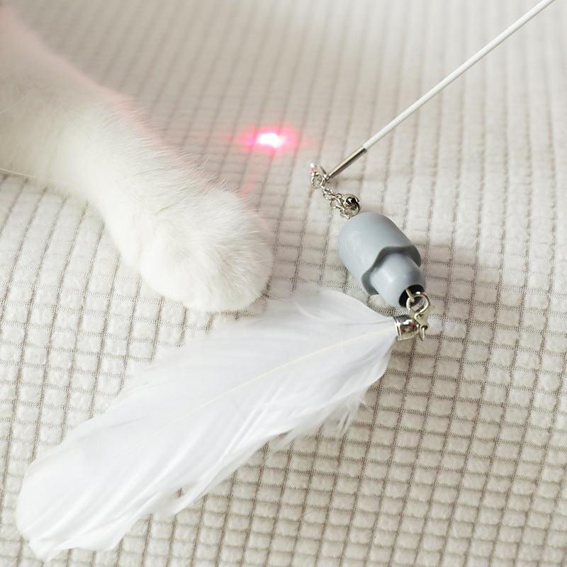 Close-up of the feather teaser attachment on the PawFlutter™ cat wand.