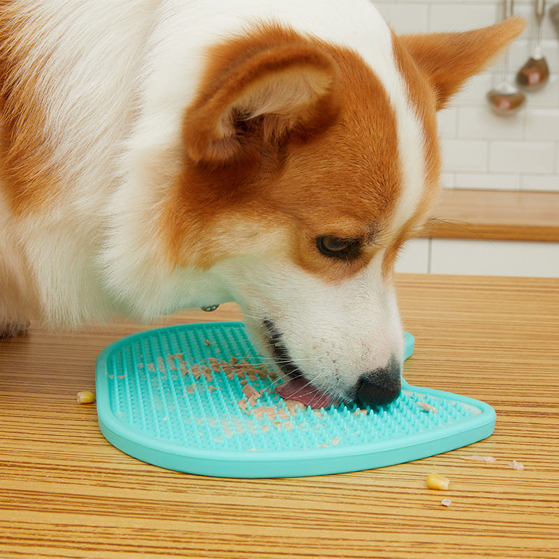 PawLick™ Premium Slow Feeder & Lick Mat for Dogs with a dog enjoying a slow feeding session