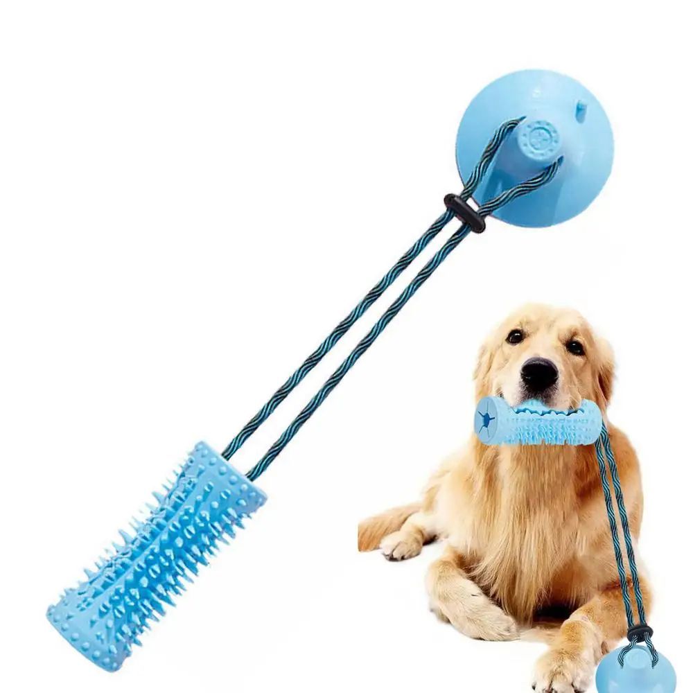 PawTug™ interactive suction cup dog tug toy in blue with golden retriever chewing the toy.