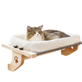 Indoor cat relaxing on the PawView™ Luxury Window Cat Perch by the window.