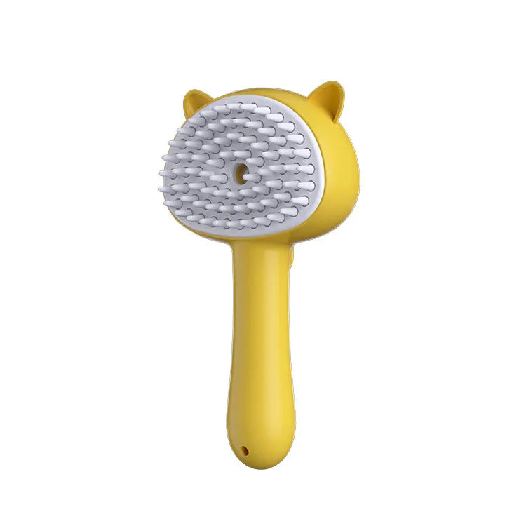 Yellow cat-shaped pet grooming brush with soft silicone bristles for gentle deshedding