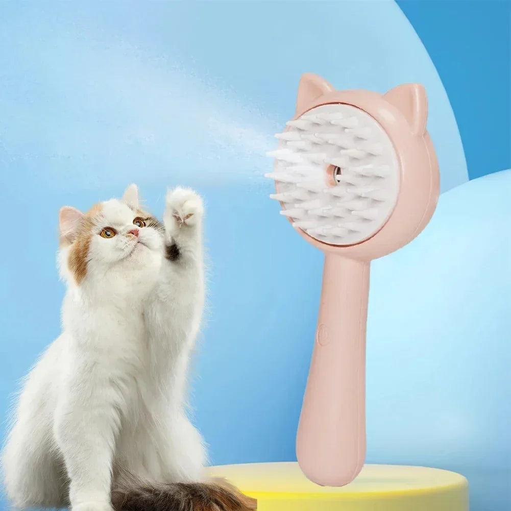 Pink cat-shaped grooming brush with mist spray for fluffy white cat, pet care accessory